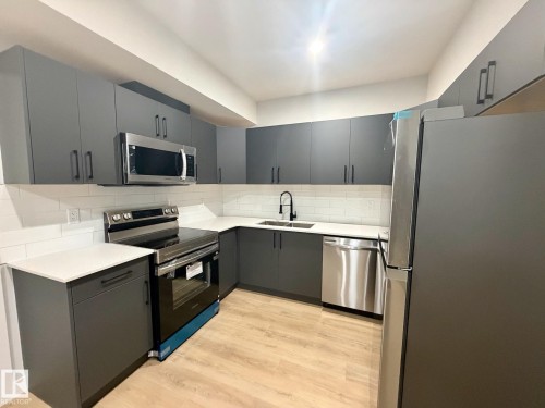 #Bsmt 137 29 St Sw Sw, Edmonton, AB - Indoor Photo Showing Kitchen With Double Sink With Upgraded Kitchen