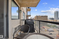 Private balcony with glass panel railing - 