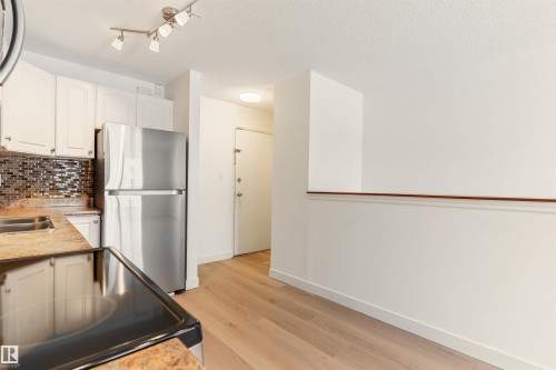 109 11429 124 Street, Edmonton, AB - Indoor Photo Showing Kitchen With Stainless Steel Kitchen With Double Sink