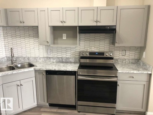 405 151 Edwards Drive, Edmonton, AB - Indoor Photo Showing Kitchen With Double Sink With Upgraded Kitchen