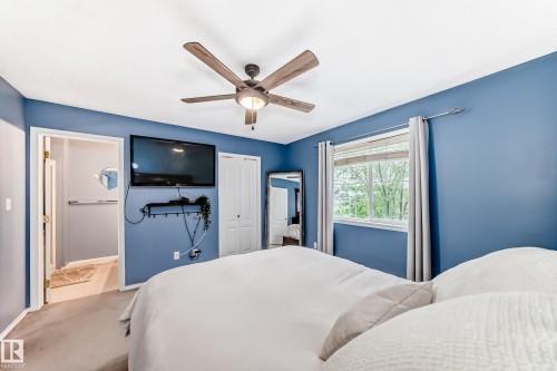 Interior room featuring blue painted walls and a white ceiling - 17233 88 Street, Edmonton, AB - Indoor Photo Showing Bedroom