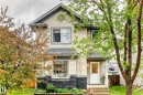 Two-story residence featuring light-toned siding and a contrasting dark stone facade - 17233 88 Street, Edmonton, AB  - Outdoor 