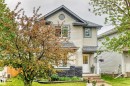 Two-story residence featuring light-colored siding and dark shingle roofing - 17233 88 Street, Edmonton, AB  - Outdoor 