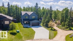 Contemporary dark blue exterior with gabled roof lines - 