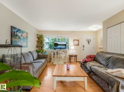 Light wood-finish flooring throughout the space - 
