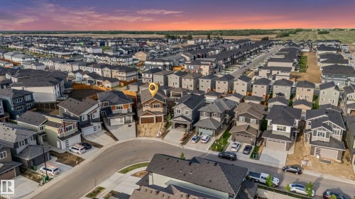 Aerial perspective showcasing a residential community with contemporary architecture - 4015 39 Street, Beaumont, AB - Outdoor With View
