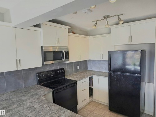 48 Dunlop Wynd, Leduc, AB - Indoor Photo Showing Kitchen