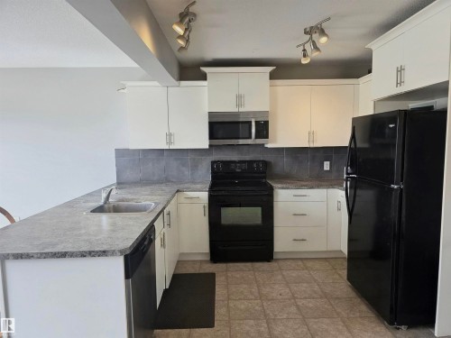 48 Dunlop Wynd, Leduc, AB - Indoor Photo Showing Kitchen