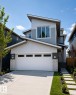 Modern architecture featuring a multi-pitched roofline and a two-car garage - 167 Starling Way, Fort Saskatchewan, AB  - Outdoor 