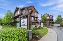 Multi-level property featuring a brown and tan exterior with wood-finish siding and shake accents - 36 1005 Graydon Hill Boulevard, Edmonton, AB 