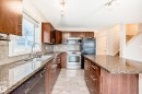 1285 Cunningham Drive, Edmonton, AB  - Indoor Photo Showing Kitchen With Double Sink 