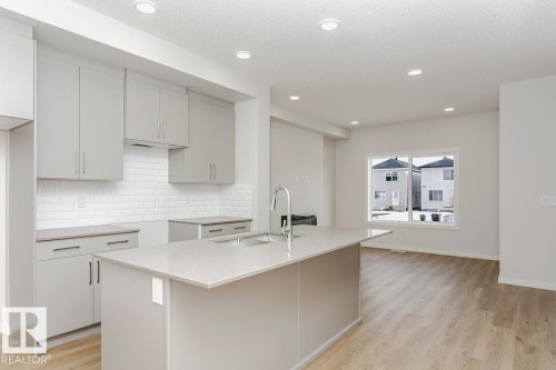 61 Gambel Loop, Spruce Grove, AB - Indoor Photo Showing Kitchen With Double Sink With Upgraded Kitchen
