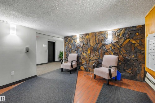 103 10138 116 Street, Edmonton, AB - Indoor With Fireplace