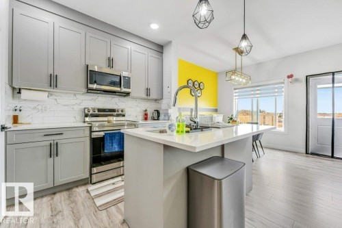 3923 40 Avenue, Beaumont, AB - Indoor Photo Showing Kitchen With Upgraded Kitchen