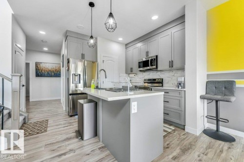 3923 40 Avenue, Beaumont, AB - Indoor Photo Showing Kitchen With Upgraded Kitchen