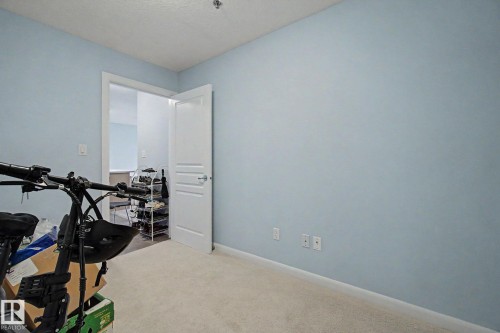Image quality insufficient for description - 303 530 Hooke Road, Edmonton, AB - Indoor Photo Showing Other Room