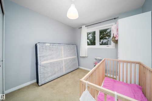 Soft gray walls and neutral carpeting create a versatile interior palette - 8512 142A Avenue, Edmonton, AB 