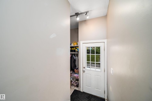 White paneled door with windowpanes - 8512 142A Avenue, Edmonton, AB 
