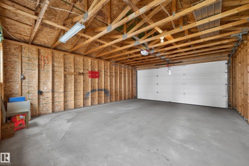 5917 South Terwillegar Boulevard, Edmonton, AB - Indoor Photo Showing Garage