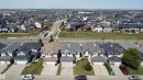 Residential neighborhood featuring diverse architectural styles and paved roadways - 6144 166 Avenue, Edmonton, AB 