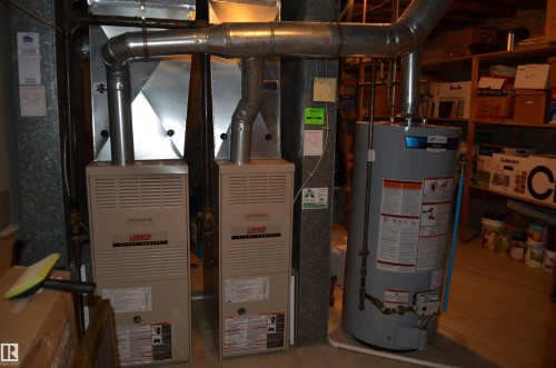 Dual Lennox brand furnaces and a water heater - 68 Marlboro Road, Edmonton, AB 