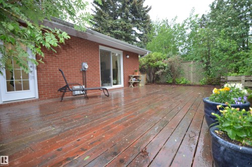 Spacious wood deck with red brick exterior - 68 Marlboro Road, Edmonton, AB 