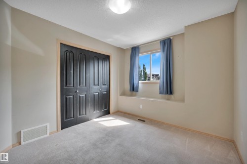 Neutral wall paint with carpet flooring - 40 604 62 Street, Edmonton, AB 