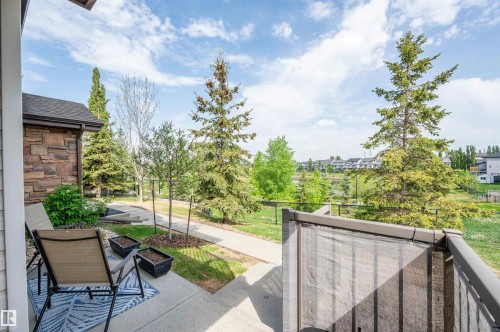 Exterior patio featuring concrete flooring and a partial stone facade - 40 604 62 Street, Edmonton, AB 