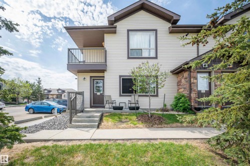 Two-story exterior featuring neutral siding and stone accents - 40 604 62 Street, Edmonton, AB 