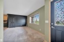 Entryway featuring a decorative stained-glass panel door - 40 604 62 Street, Edmonton, AB 