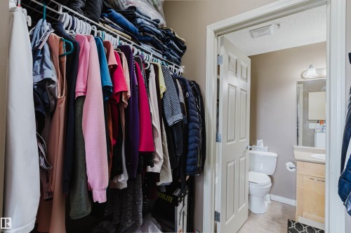 Walk-in closet featuring built-in wire shelving - 1-405 4245 139 Avenue, Edmonton, AB 