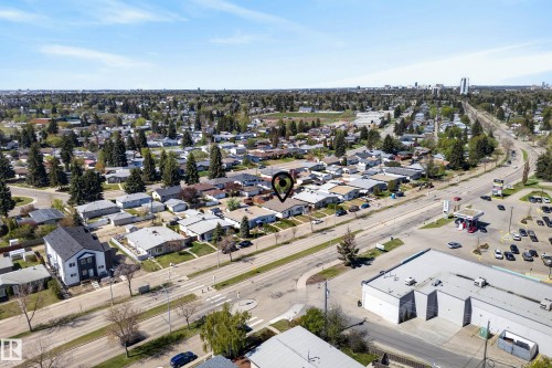 Aerial perspective showcasing the property within a developed neighborhood - 6203 90 Avenue, Edmonton, AB 