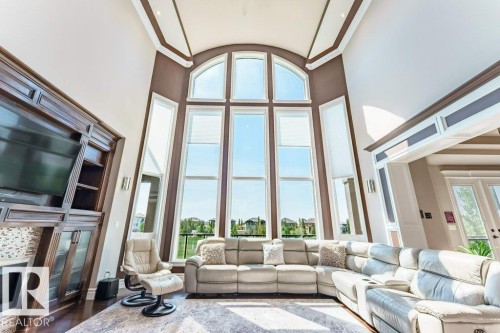 Soaring ceiling height with multi-story arched windows - 328 52327 Range Rd 233, Rural Strathcona County, AB 