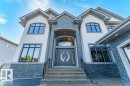 Contemporary residence featuring a stucco and stone facade - 328 52327 Range Rd 233, Rural Strathcona County, AB 