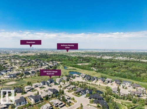 Aerial perspective showcasing a residential community with varied architectural styles - 328 52327 Range Rd 233, Rural Strathcona County, AB 