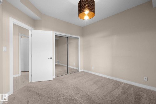 Bedroom - 309 625 Leger Way, Edmonton, AB 