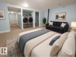 Virtually staged basement used as cozy bedroom.  Could be used as a Theatre room or cozy family room too. - 