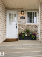 Added a flower box and a welcome sign. - 