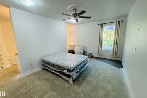 553 11207 Twp R 564, Rural St. Paul County, AB - Indoor Photo Showing Bedroom
