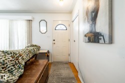 Entryway with hardwood floors - 