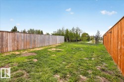 Expansive outdoor space featuring a lush green lawn - 