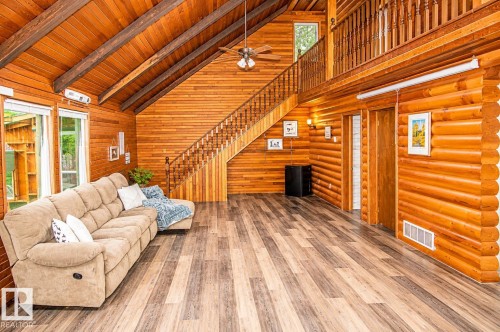 Vaulted ceilings featuring exposed wood beams and a ceiling fan - 61 Stang Cres, Rural Two Hills County, AB 
