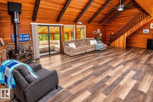 Vaulted wood-paneled ceilings with exposed beams - 61 Stang Cres, Rural Two Hills County, AB 