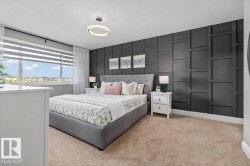 Bedroom featuring a striking accent wall with dimensional paneling, a large window with horizontal blinds, and a contemporary ceiling light fixture - 