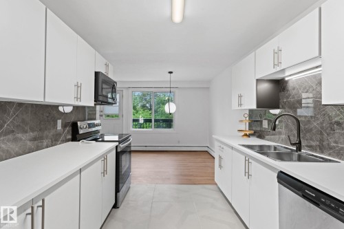 202 7815 159 Street, Edmonton, AB - Indoor Photo Showing Kitchen With Double Sink