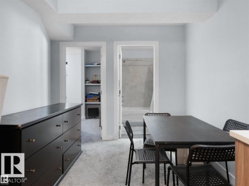 Light gray walls complemented by textured carpeting throughout - 207 41 Avenue, Edmonton, AB 