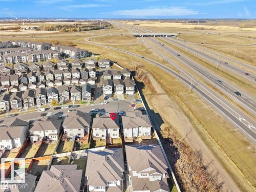 Aerial perspective showcasing a residential community and nearby highway infrastructure - 207 41 Avenue, Edmonton, AB 