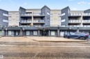 Multi-story building with a contemporary facade featuring balconies with glass railings - 304 10116 80 Avenue, Edmonton, AB 