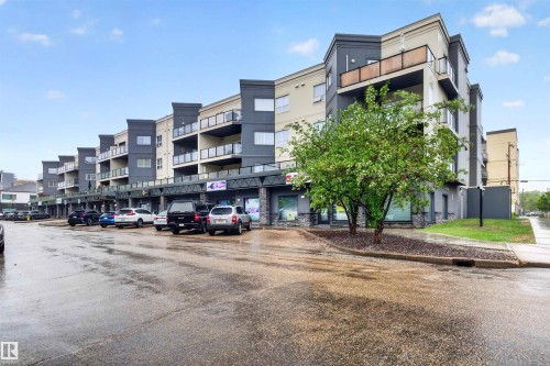 Contemporary mixed-use building featuring commercial ground-floor retail and residential units above - 304 10116 80 Avenue, Edmonton, AB 