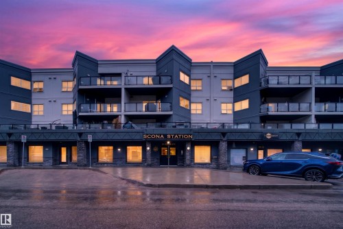 Modern multi-story building featuring balconies with glass railings - 304 10116 80 Avenue, Edmonton, AB 